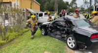 3 injured in crash, truck hits building in Burton