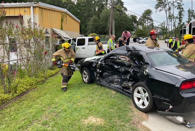 3 injured in crash, truck hits building in Burton