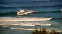 75-foot boat surfs wave, runs aground in Hawaii