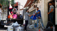 Alawite families flee Damascus suburb after violence and eviction threats