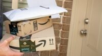 Person holding Amazon Prime packages at a front door.