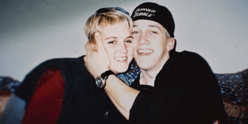 Photo of Amy Lynn Bradley and a man embracing.