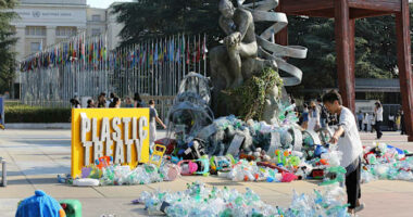 Artist drowns sculpture in plastic waste in front of the UN during plastic pollution treaty talks