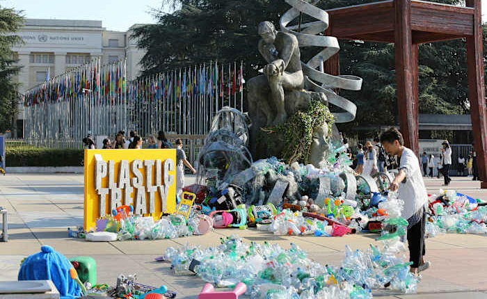 Artist drowns sculpture in plastic waste in front of the UN during plastic pollution treaty talks