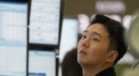 Asian shares are mixed after stocks add a bit to their records on Wall Street