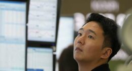 Asian shares are mixed after stocks add a bit to their records on Wall Street