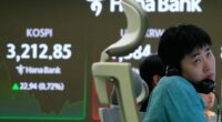 Asian shares charge higher after US stocks rally to records on hopes for interest rate cuts
