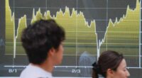 Asian shares trade mostly higher after stocks on Wall Street extend losses
