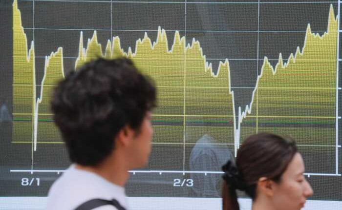 Asian shares trade mostly higher after stocks on Wall Street extend losses
