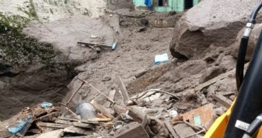 Building damaged by flash floods in a mountainous village.