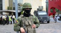Military police guarding a building before a presidential debate.
