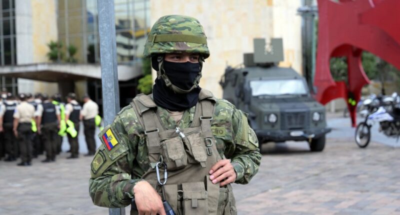 Military police guarding a building before a presidential debate.