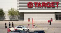 Police officers at a Target store crime scene.