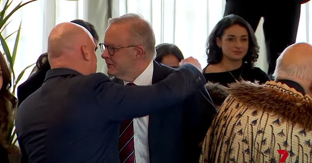 Albanese ended up having to awkwardly hug Luxon, after attempting hongi