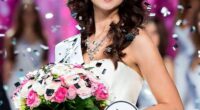 Miss Russia 2017 runner-up Ksenia Alexandrova holding a bouquet.