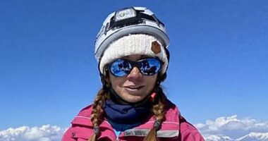 Bid to save woman stuck on mountain with broken leg is called off
