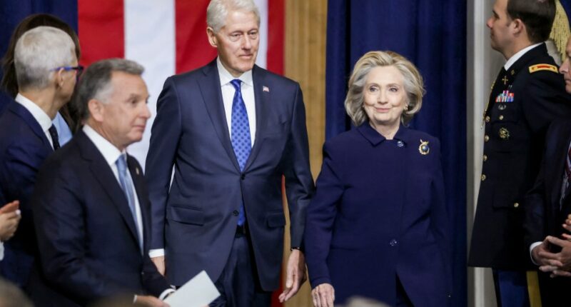 Bill and Hillary Clinton at an event.
