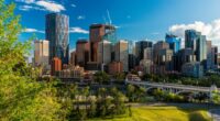 Calgary skyline with a bridge and river.