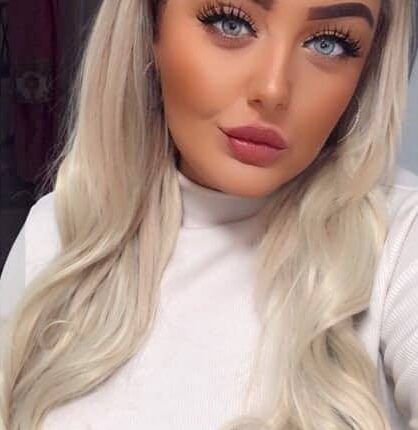 Headshot of Kim Hall, a British beautician.
