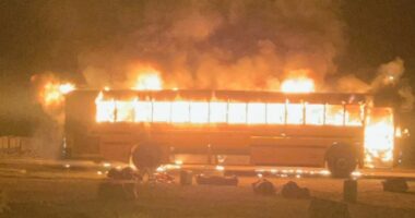 Bus carrying Pana football team catches fire in Witt, no one hurt