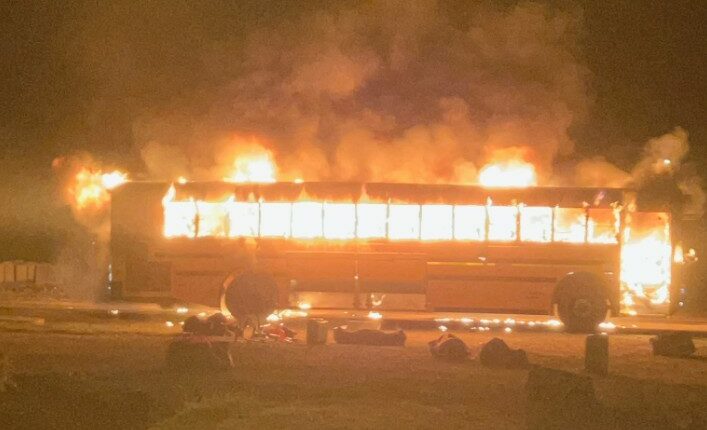 Bus carrying Pana football team catches fire in Witt, no one hurt