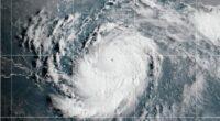 Category 4 Hurricane Erin moves past northern Caribbean islands but not forecast to hit land