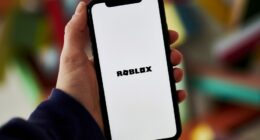 Smartphone displaying the Roblox logo.