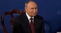 Chilling sight of Putin shaking his head and shouting over journalists