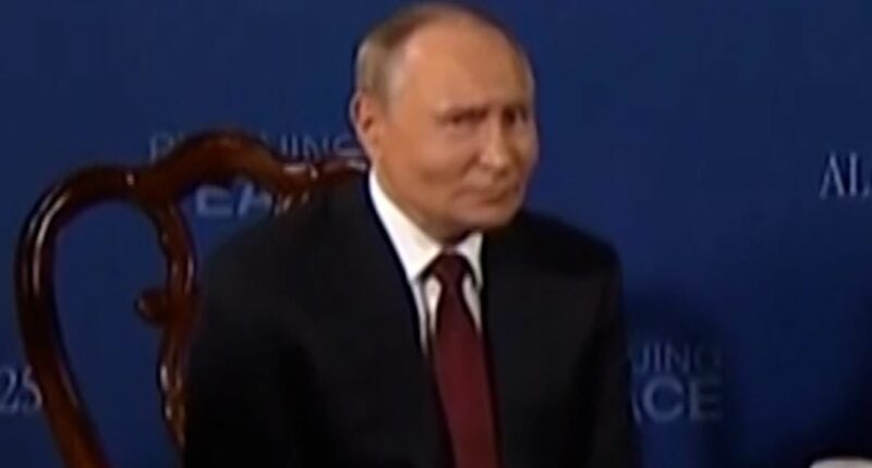 Chilling sight of Putin shaking his head and shouting over journalists