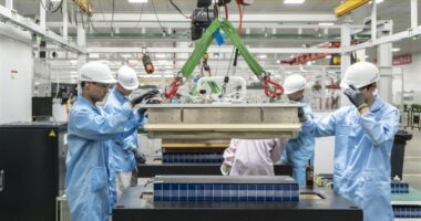 Workers on the battery pack manufacturing line at the Zhejiang Leapmotor Technology production facility in Jinhua, Zhejiang province, China