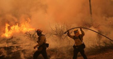 Colorado prison evacuated as growing wildfire becomes one of the largest in state history