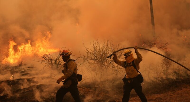 Colorado prison evacuated as growing wildfire becomes one of the largest in state history