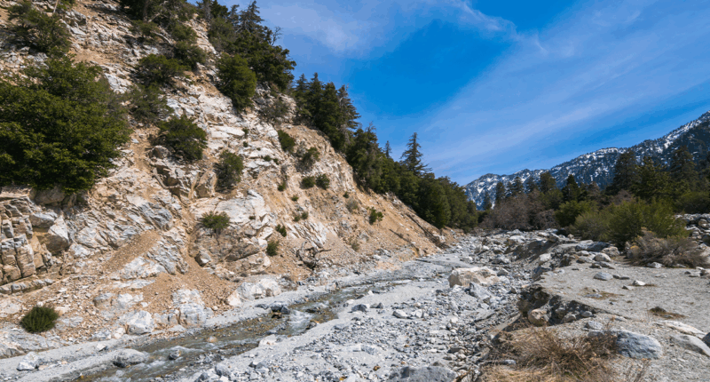 Cries for help lead rescuers to injured hiker after terrifying 25-foot plunge at popular waterfall
