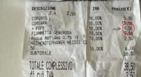 Receipt showing a €0.50 charge for adding pepper to a pizza.