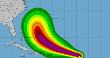 Deadly storm Erin is upgraded to hurricane status