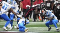 Detroit Lions' Morice Norris is left motionless after frightening hit