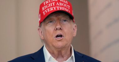 Donald Trump speaking at The People's House museum, wearing a red hat that reads "Trump Was Right About Everything".