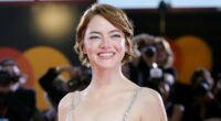 Emma Stone shares a kiss with husband Dave McCary at Bugonia premiere