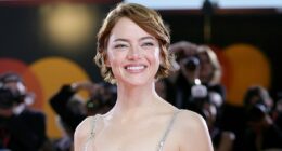 Emma Stone shares a kiss with husband Dave McCary at Bugonia premiere
