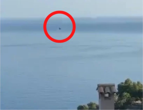 Plane wreckage in the sea.
