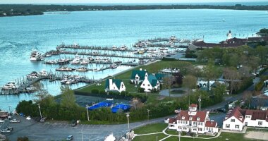 Exclusive waterfront enclave rocked after body found near yacht club