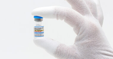 FDA approves updated COVID-19 vaccine but limits access to shots for some kids and adults