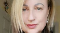 Photo of a woman with blonde and brown hair.