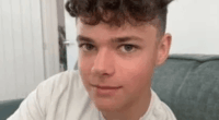 Photo of a young man with curly hair.