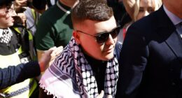 Fans outside court to support rapper who 'displayed Hezbollah flag'