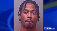 TJ Yeldon mugshot, placed on a blue background with the WKRG.com logo