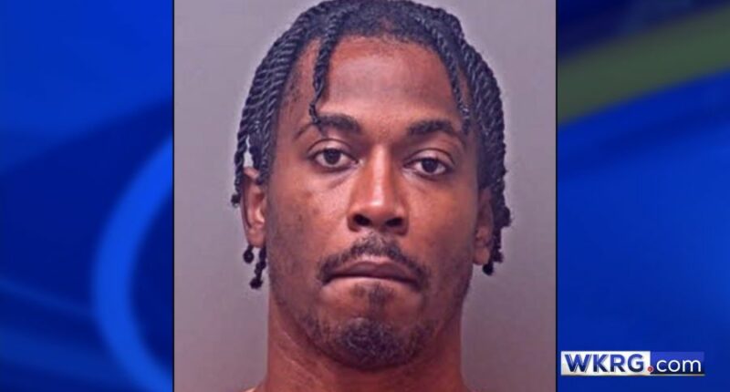 TJ Yeldon mugshot, placed on a blue background with the WKRG.com logo