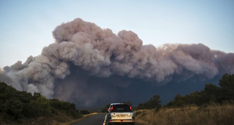 France's wildfire the size of PARIS is raging after Spain evacuations