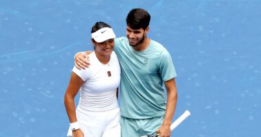 Giggling Emma Raducanu and Carlos Alcaraz show how much they enjoy each other's company with plenty of chemistry in US Open mixed doubles defeat, writes MATTHEW LAMBWELL