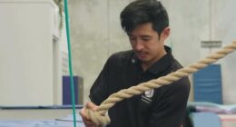 Coach Wei Jun Lee runs a Gold Coast gymnastics studio.